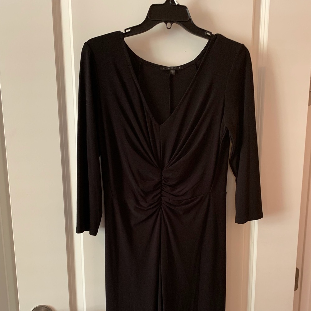 NWOT short flattering dress. Never worn.